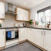 Photo 4: Fully equipped kitchen with dishwasher and Miele oven