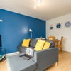 Photo 5: Comfy living area with double doors out onto private garden