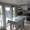 Photo 8: View of kitchen with shared oven