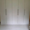 Photo 6: Fitted cupboards 