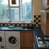 Photo 3: Kitchen with breakfast bar