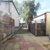 Photo 8: Rear patio/parking