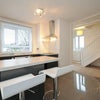 Photo 2: Open plan kitchen and dining