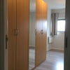 Photo 4: 5 Doors Tall Mirrored Wardrobe. New Cool Grey Wood Floor