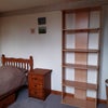 Photo 4: Bed, bedside table, bookshelf and linen basket