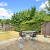 Photo 5: Pretty Garden with Patio Set Decking and BBQ