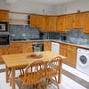 Photo 7: Large kitchen with dining space
