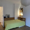 Photo 3: Sitting room/larger bedroom
