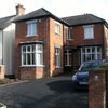 Photo 1: Front with off street parking 