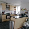 Photo 4: Big kitchen space with new appliances, big fridge, induction hob, dishwasher and washing machine