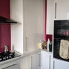 Photo 6: Kitchen with double oven and 5 ring hob