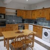 Photo 8: Large kitchen with dining space