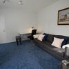 Photo 3: Lounge showing the entrance from the kitchen