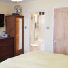 Photo 8: Front bedroom with en-suite loo, bath & shower room.