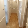 Photo 4: Storage in hallway