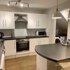 Photo 3: Kitchen - also has utility area with washing machine, tumble dryer, large fridge/freezer