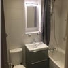 Photo 6: Bathroom.