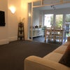 Photo 1: Large living room with open plan diner