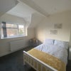 Photo 7: Offsuite Room 7