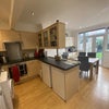 Photo 10: Well equipped Kitchen & Dining Area with Patio Doors leading to Private Garden 
