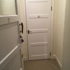 Photo 1: Entrance hall with storage cupboard