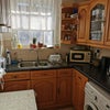 Photo 6: Kitchen with a table