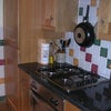 Photo 3: Kitchen immediately adjacent to Dining Rm overlooking rear garden