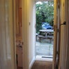 Photo 2: View through entrance to garden