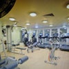 Photo 2: There is use of a full Gymnasium overlooking the Swimming Pool