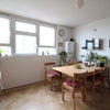 Photo 4: Kitchen with table & TV