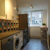 Photo 6: German branded dishwasher, washing machine, fridge/freezer. Breakfast bar by window