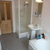 Photo 3: Modern power shower cubicle and large baths to BATHROOMS