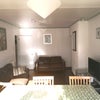 Photo 4:  Very large sunny, comfy lounge with very big dining table & chairs , huge TV & extremely fast WIFI 