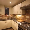 Photo 3: Stylish, modern kitchen