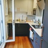 Photo 8: Kitchen that also opens out onto the garden