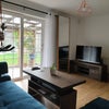 Photo 4: Living room showing French doors leading into the garden