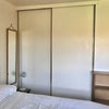 Photo 2: Fitted cupboards, handing and storage shelves