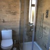 Photo 2: Typical bathroom - waterfall shower and handheld shower