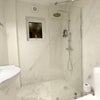 Photo 4: Wetroom style bathroom