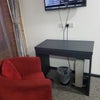 Photo 2: Desk and TV area