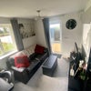Photo 1: Modern, trendy and cosy lounge space with view on to the paddock.