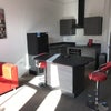 Photo 4: Seating area and breakfast bar