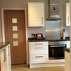 Photo 3: Kitchen with built-in appliances.