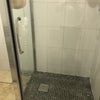 Photo 2: Large tiled walk in shower