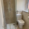 Photo 7: Modern ensuite, mirror cabinet, shaver point, chrome towel radiator, easy clean shower panels.
