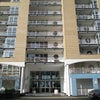 Photo 2: Front view of building