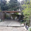 Photo 7: Rear garden with covered patio