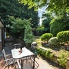 Photo 6: Stunning Garden with Patio Set and BBQ