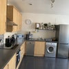 Photo 4: Large kitchen leading onto terrace