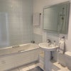 Photo 3: Large clean bathroom